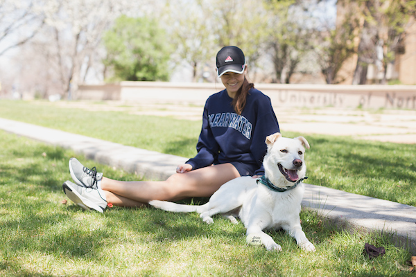 UNC Student with her pet dog